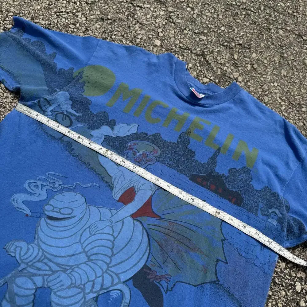 Vintage 90s Michelin Man All Over Print Graphic T-Shirt